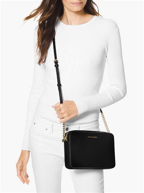 michael kors saffiano crossbody black|Michael Kors jet set handbag.